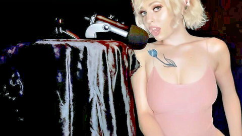 Blonde babe with big tits in tight pink top sticks tongue out at mic for dirty ASMR talk