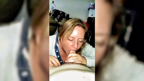Mature blonde woman sucking thick cock during intense blowjob closeup