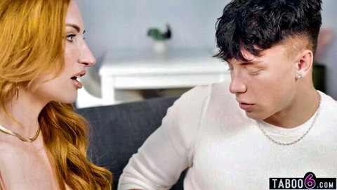 Curvy redhead stepmom faces off with angry stepson in tense closeup