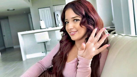 Vanessa Marie redhead Latina smiling and waving in pink top POV tease
