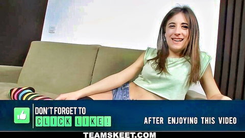 Cute brunette smiling in green crop top and shorts