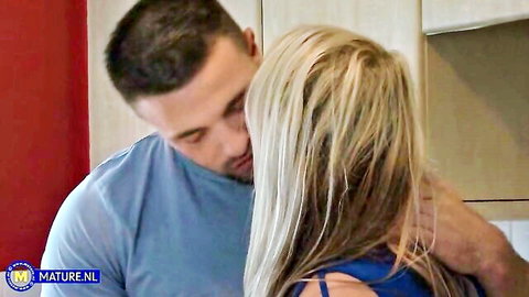Kaz B in intimate embrace with stepson, blonde milf in blue dress