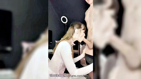 Blonde ponytail babe in sheer top sucks muscular guy's thick cock closeup