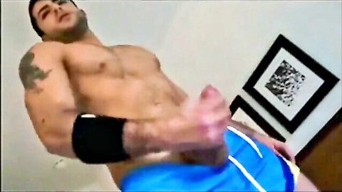 Tattooed muscular hunk exposing huge boner in blue shorts amateur thumbnail