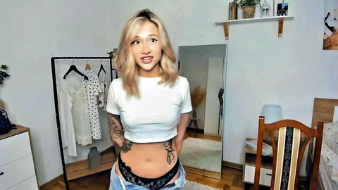 Glossybabe blonde in slutty white crop top and blue panties, tattoos visible