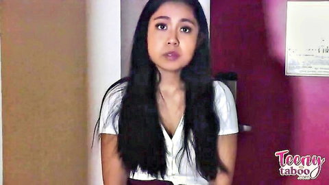 Luna Mills seductive teen in low-cut white top, long dark hair