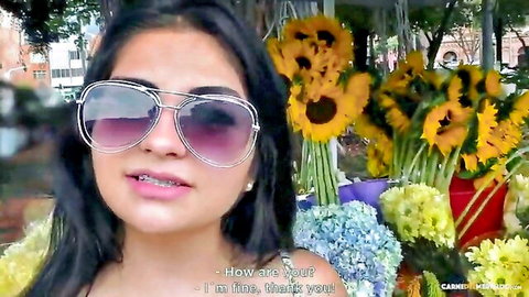 Leidy Silva, Colombian amateur, smiling in sunglasses with flowers, teaser for MMF threesome