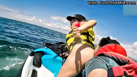 Curvy MILF exposes shaved pussy and big ass on jet ski outdoors with man behind ready to fuck