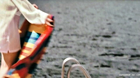 Elizabeth Olsen casual poolside moment in Martha Marcy May Marlene (2011)