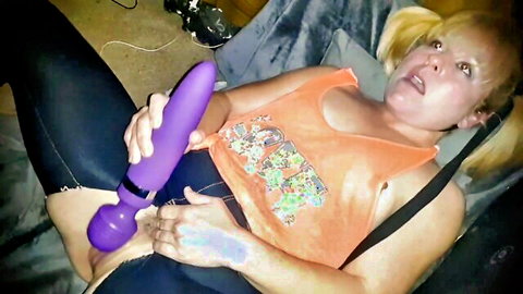 Blonde babe presses purple Hitachi wand vibrator on her exposed pussy, intense orgasm face while solo masturbating