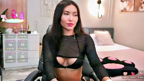 Sexy Asian webcam girl in sheer black mesh top and bra exposing deep cleavage