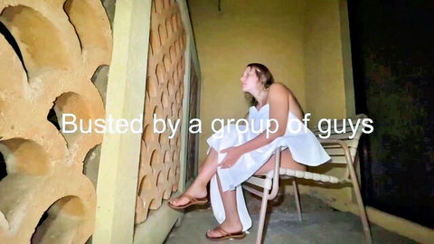 Amateur wife in white dress spreads legs teasing on balcony busted by group of guys