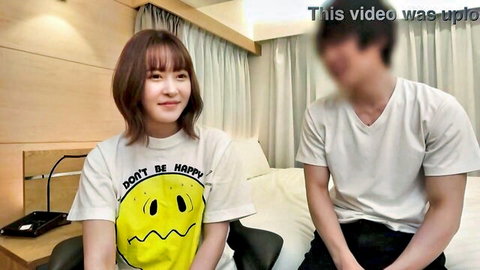 Ayu the masochistic housewife in casual t-shirt, smiling with blurred partner in bedroom gonzo