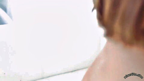 Alison Tyler nude back view, red hair, entering white room