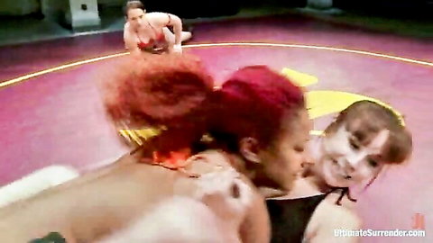 Redhead and brunette babes in intense lesbian wrestling with double fingering