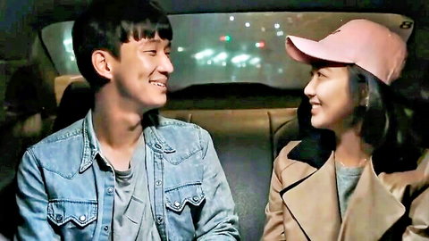 Korean couple in romantic car intimacy, smiling close-up