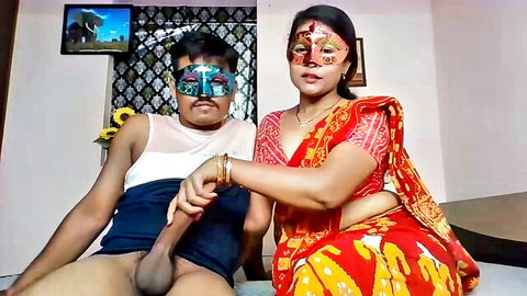Masked Indian man exposes throbbing hard cock while saree-clad woman grips his thigh