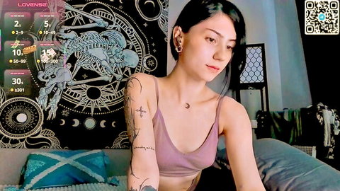 Sweathome sexy brunette in pink crop top, tattooed arm, sensual gaze