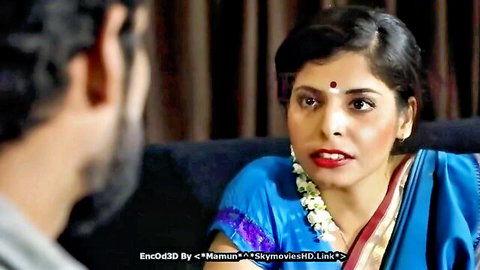 Desi Indian Tamil woman in blue saree with man, intimate couple scene