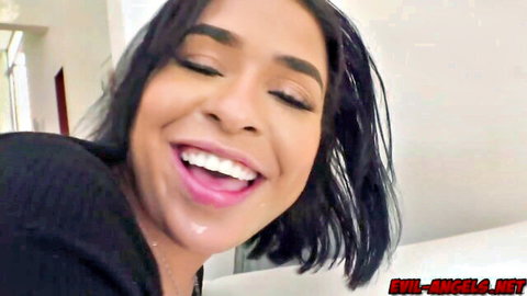Ryder Rey smiling seductively in Evil Angel adult video thumbnail