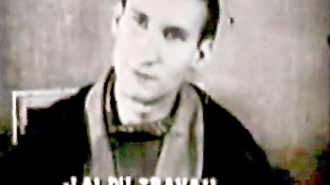 Vintage black and white closeup portrait of man in scarf named Julie Strauss