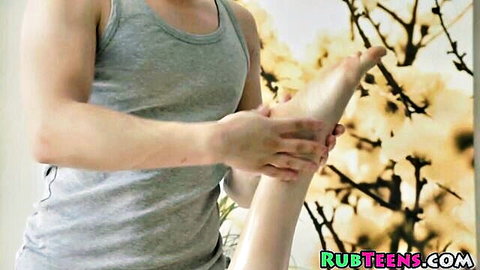 Asian teen getting erotic foot massage by masseur