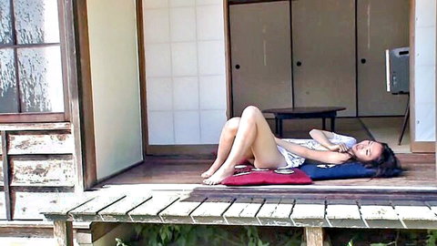 Asian woman lying on veranda, wet red panties pulled aside exposing pussy, JAV style