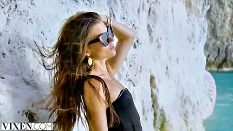 Stefany in black swimsuit posing on scenic white cliffs, Vixen road trip