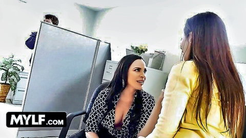 Busty MILFs Dana DeArmond and Ariella Ferrera in cleavage-baring office tease