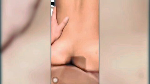 Muscular Asian gay bottom exposing ass with hands spreading cheeks