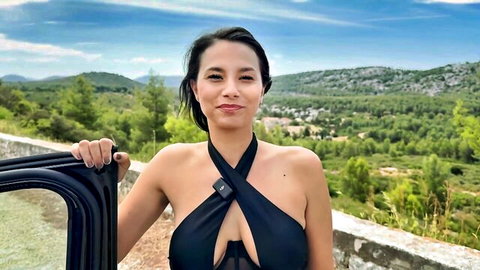 Lia, 28, in revealing black swimsuit posing by car in mountains