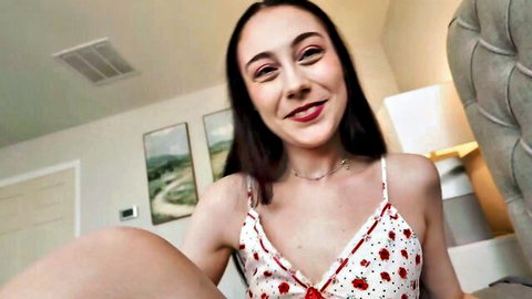 Cute brunette smiling seductively with small tits in polka dot top POV tease