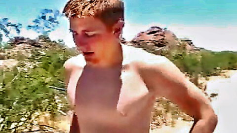 Ginger Sean shirtless outdoors in desert, lean muscular build