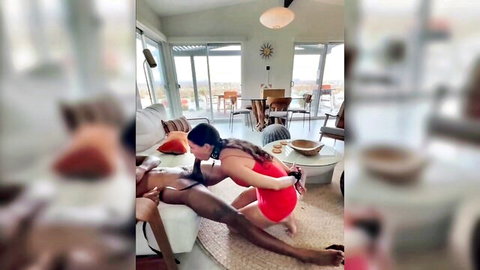 Brunette in red mini dress kneels to worship black man's thigh in kinky interracial fetish