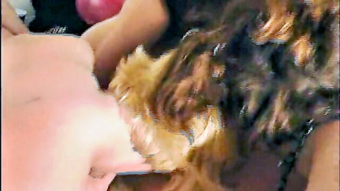 Close-up of woman with long brown hair in intimate dare game scene