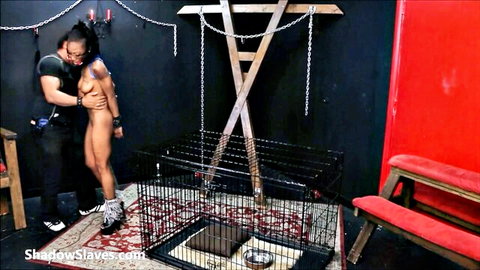 Ebony slave Harmony nude and bound in intense BDSM embrace