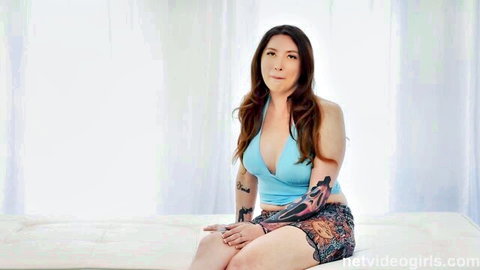 Brunette Lana in blue halter top and skirt, teasing solo pose