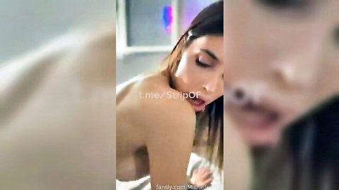 Sensual brunette MILF in intimate closeup, mouth open in pleasure