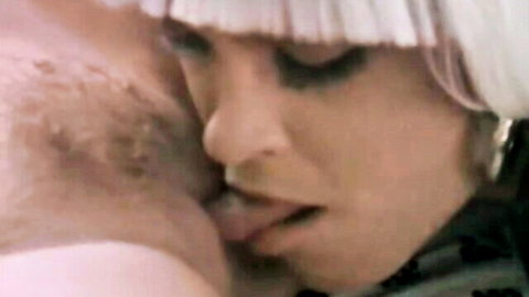 Tori Welles big tits close-up with Peter North intimate kiss
