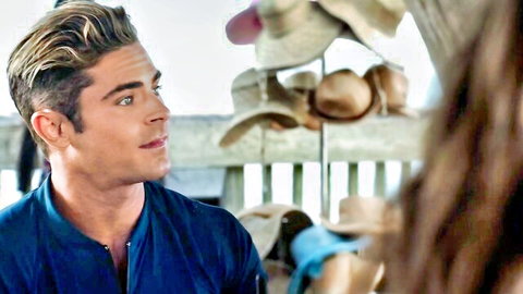 Zac Efron with Alexandra Daddario in Baywatch 2017 beach scene