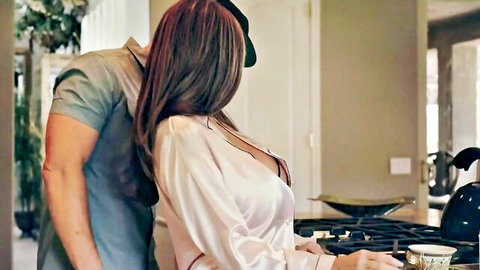 Busty cougar Ava Addams in open silk robe hugged from behind by lover