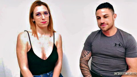 Busty French amateur redhead MILF in low-cut top showing deep cleavage with tattooed muscular stud