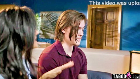 Hot stepmom with long dark hair talks to clueless stepson in maroon shirt, taboo guidance scene