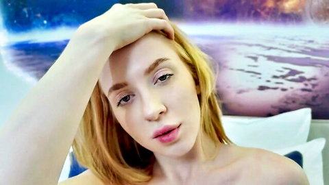 Topless redhead teen babe with freckles pouts seductively hand on forehead bare shoulders