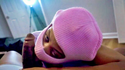 Stacy in pink balaclava mask gives deep throat to black stud
