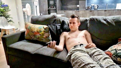 Shirtless young stepson lounging on couch, Tania Amazon OnlyFans tease