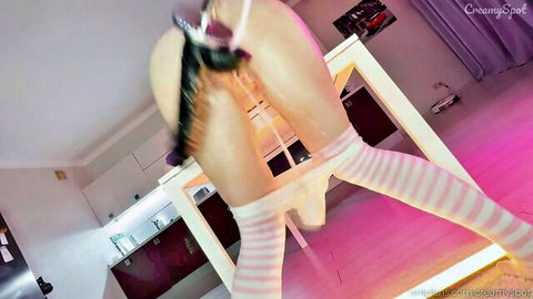 Girl in striped knee socks fucks creamy pussy with thick black dildo bent over kitchen table