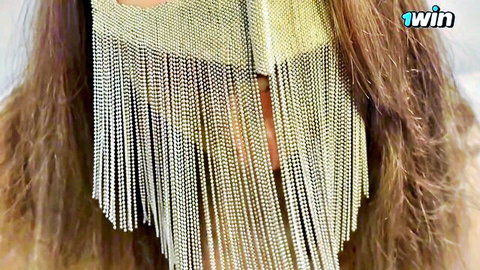 Parisa in gold chain veil mask, seductive gaze in sexy talk video