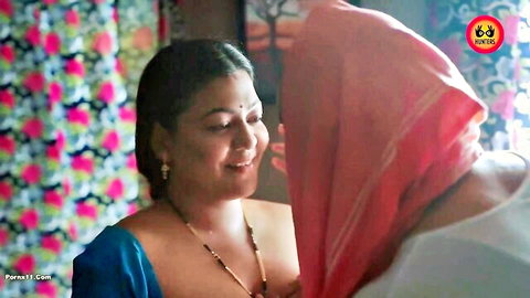 Indian MILF in blue saree smiling in intimate couple scene
