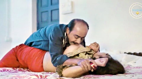 Mature Indian man squeezes big bare tits of housewife in disheveled saree on bed